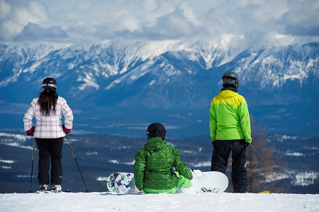 Skiers on the mountaintop of Kimberley Alpine Resort on the Powder Highway