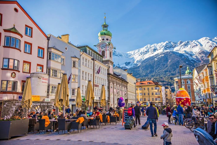 City of Innsbruck in Tyrolean Alps with view of mountains in background