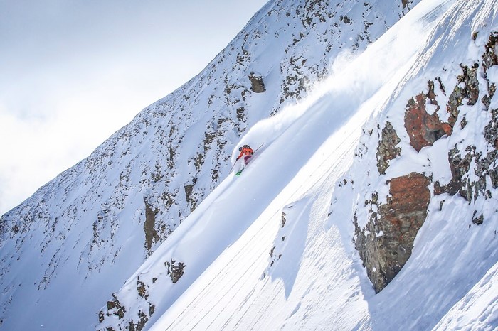 Skier coming down a chute at Big Sky Mountain Resort