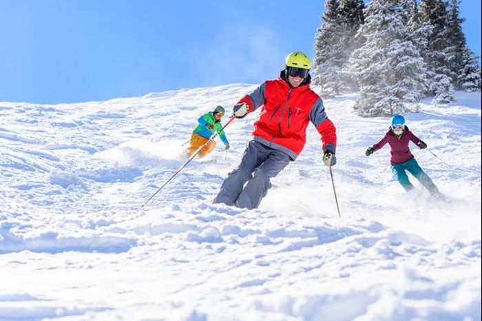 Group skiing the highest vertical in the US at Telluride