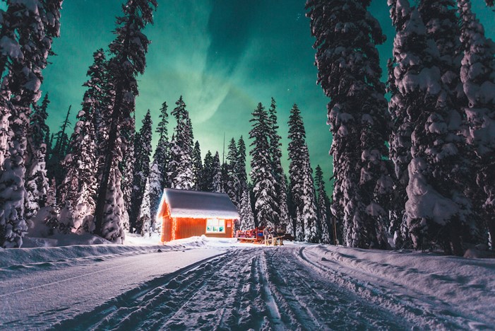 Rustic cabin at the end of the horse-drawn sleigh ride at Big White