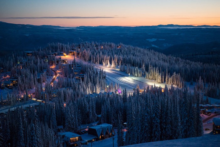 Night skiing runs lit up in evening at SilverStar