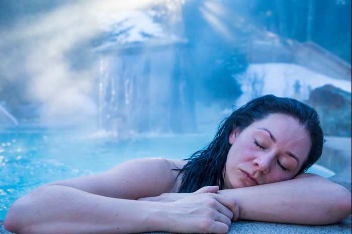 Woman relaxing at the Scandinave Spa in Whistler Village