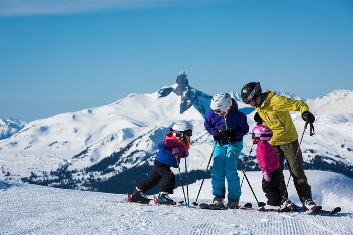 Family of skiers on the slopes at Whistler Blackcomb