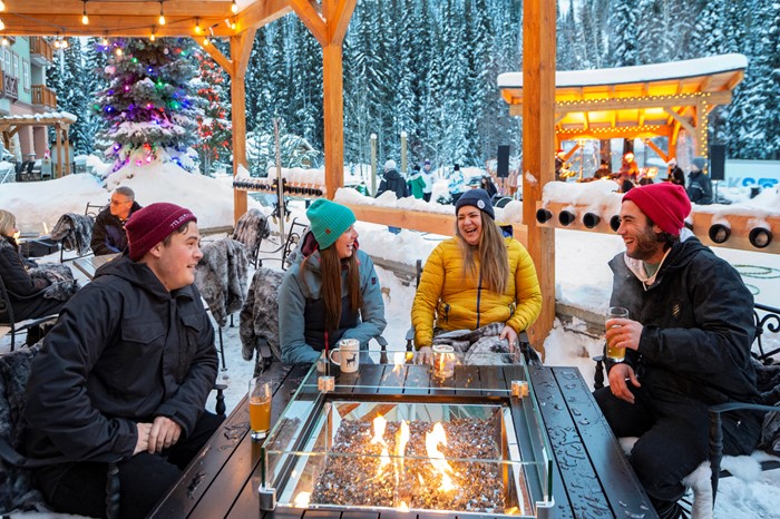 Group drinking on an outdoor patio at Sun Peaks