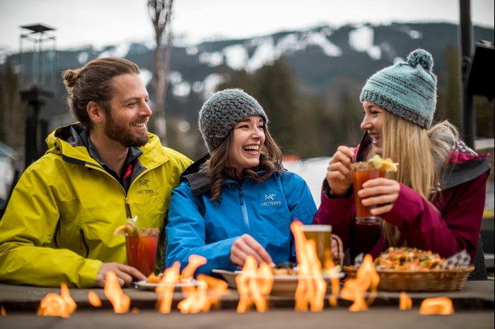 Group enjoying apres-ski drinks at Whistler