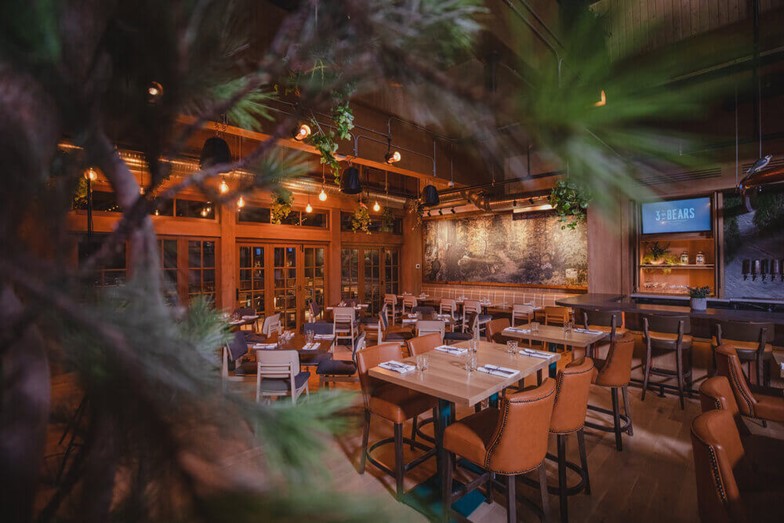 Three Bears rustic dining room with cedar accents and pine bow details