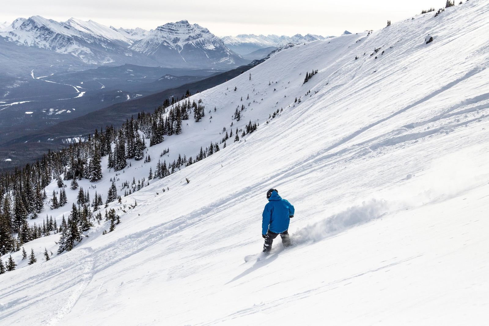 Marmot Basin solo snowboarder