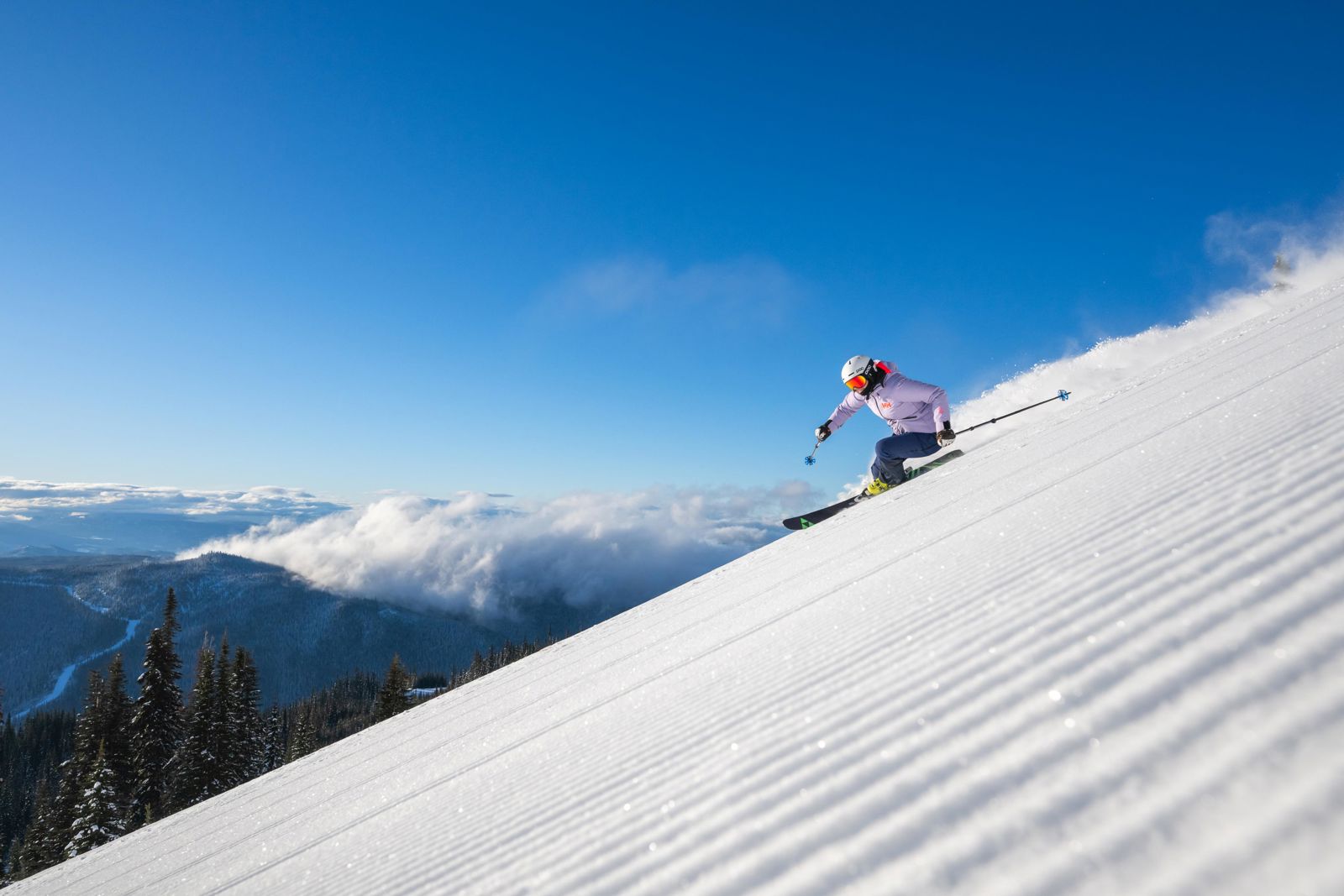 Sun Peaks BC corduroy bright skier